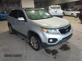 2011 Kia Sorento EX with VIN 5XYKUDA21BG024857, listed as a IAAI auction lot 42243340 with 145,514 mi miles and . Bid and sale history available at DreamBid. Image 1.
