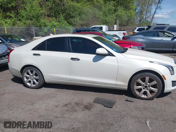 2013 Cadillac ATS with VIN 1G6AG5RX5D0178136, listed as a IAAI auction lot 42220395 with 147,066 mi miles and . Bid and sale history available at DreamBid. Image 13.