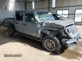2023 Jeep Gladiator Overland with VIN 1C6HJTFG2PL542657, listed as a Copart auction lot 63384465 with 29,728 mi miles and Non repairable. Bid and sale history available at DreamBid. Image 4.