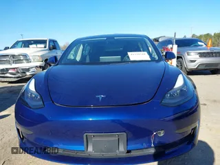 2022 Tesla Model 3 Long Range with VIN 5YJ3E1EB1NF257059, listed as a IAAI auction lot 41329318 with 30,652 mi miles and . Bid and sale history available at DreamBid. Image 12.
