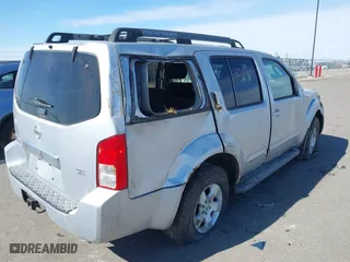 2005 Nissan Pathfinder LE with VIN 5N1AR18W05C779913, listed as a IAAI auction lot 41830468 with 216,967 mi miles. Bid and sale history available at carsss.com. Image 4.