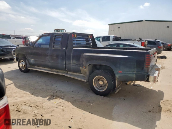 1992 GMC Sierra 1500 with VIN 2GTHC39NXN1556192, listed as a Copart auction lot 55469485 with 128,938 mi miles and Clean Title. Bid and sale history available at DreamBid. Image 2.