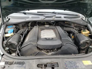 2006 Volkswagen Touareg 4.2L V8 z VIN WVGZM77L16D049631, wystawiony jako Copart lot #84882844 z przebiegiem Nie podano mil oraz Szkoda całkowita • Salvage title. Historia ofert i sprzedaży dostępna na DreamBid. Obrazek 12.