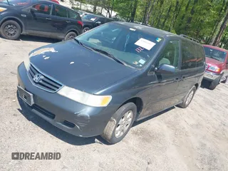 2003 Honda Odyssey EX with VIN 5FNRL18683B132703, listed as a IAAI auction lot 42004982 with Not Provided miles and . Bid and sale history available at DreamBid. Image 2.