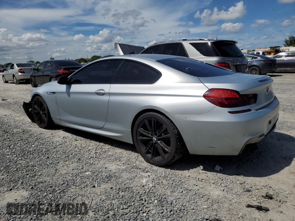 2013 BMW 6 Series 650i with VIN WBAYM9C59DDW20408, listed as a Copart auction lot 73585214 with 143,605 mi miles and Clean Title. Bid and sale history available at carsss.com. Image 2.