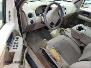 2005 Ford F-150 XLT with VIN 1FTRX12565KB21614, listed as a Copart auction lot 61488075 with 202,747 mi miles and Salvage title. Bid and sale history available at DreamBid. Image 8.