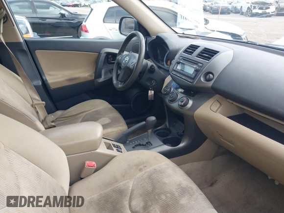 2012 Toyota RAV4 with VIN 2T3JF4DV2CW198418, listed as a IAAI auction lot 41865195 with 214,373 mi miles. Bid and sale history available at carsss.com. Image 5.