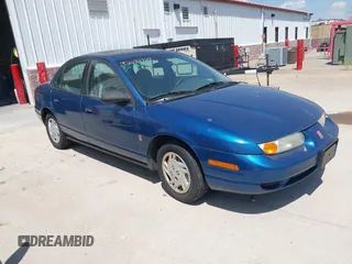 2001 Saturn SL z VIN 1G8ZF52861Z249335, wystawiony jako IAAI lot #42282924 z przebiegiem 297 817 mil mil oraz . Historia ofert i sprzedaży dostępna na DreamBid. Obrazek 1.