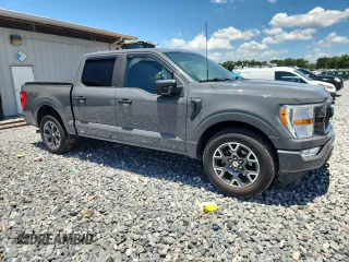 2021 Ford F-150 XL with VIN 1FTEW1CP1MFB85228, listed as a Copart auction lot 61338555 with Not provided miles and Salvage title. Bid and sale history available at DreamBid. Image 4.