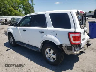 2010 Ford Escape XLS with VIN 1FMCU9C74AKC27790, listed as a Copart auction lot 53364055 with 163,298 mi miles and Salvage title. Bid and sale history available at DreamBid. Image 2.
