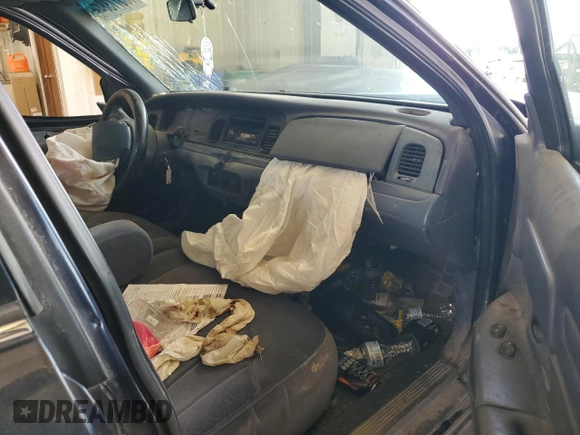 1999 Ford Crown Victoria Police с VIN 2FAFP71WXXX192272, выставлен на аукционе Copart как лот 73577384 с пробегом 278 535 миль миль и Списание • Salvage title. История ставок и продаж доступна на DreamBid. Изображение 8.