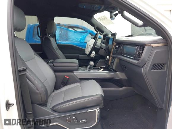 2022 Ford F-150 Lightning Pro with VIN 1FTVW1EL3NWG16132, listed as a IAAI auction lot 42362459 with 16,509 mi miles and . Bid and sale history available at DreamBid. Image 5.