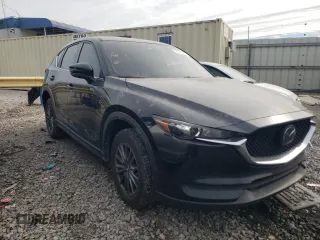 2021 Mazda CX-5 Sport with VIN JM3KFABM1M0418660, listed as a Copart auction lot 88999955 with 0 mi miles and Salvage Title. Bid and sale history available at carsss.com. Image 4.