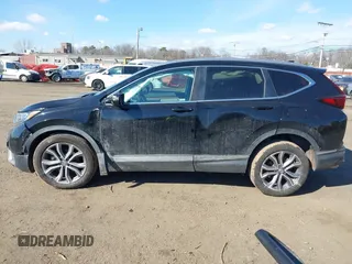 2020 Honda CR-V Touring with VIN 2HKRW2H98LH626651, listed as a IAAI auction lot 41668951 with 64,391 mi miles and . Bid and sale history available at DreamBid. Image 14.