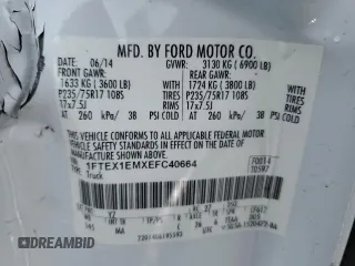 2014 Ford F-150 XL with VIN 1FTEX1EMXEFC40664, listed as a Copart auction lot 43030155 with 144,720 mi miles and Salvage Title. Bid and sale history available at carsss.com. Image 14.