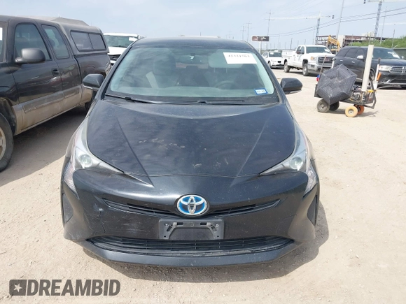 2016 Toyota Prius Two z VIN JTDKBRFU4G3509129, wystawiony jako IAAI lot #42321562 z przebiegiem 246 582 mil mil oraz . Historia ofert i sprzedaży dostępna na DreamBid. Obrazek 12.