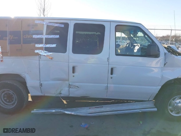 2010 Ford Econoline Wagon XL with VIN 1FBSS3BLXADA00923, listed as a IAAI auction lot 41327434 with 229,175 mi miles. Bid and sale history available at carsss.com. Image 13.