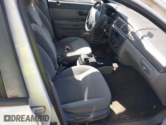 2003 Ford Taurus SE Standard with VIN 1FAFP53223A203718, listed as a IAAI auction lot 41708811 with 200,413 mi miles. Bid and sale history available at carsss.com. Image 5.