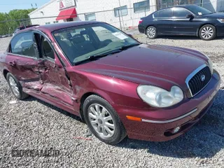 2003 Hyundai Sonata GLS with VIN KMHWF35H23A849193, listed as a IAAI auction lot 42023187 with 58,300 mi miles. Bid and sale history available at carsss.com. Image 1.