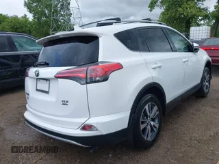 2016 Toyota RAV4 XLE with VIN 2T3RFREV8GW450273, listed as a IAAI auction lot 42281091 with 75,478 mi miles and . Bid and sale history available at DreamBid. Image 4.