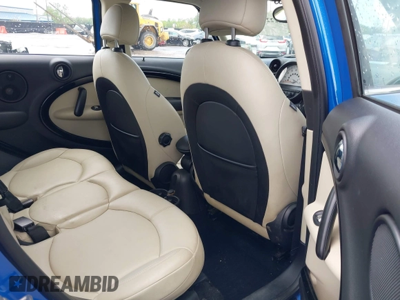 2014 MINI Countryman S with VIN WMWZC5C52EWP38659, listed as a IAAI auction lot 42229976 with 115,229 mi miles and . Bid and sale history available at DreamBid. Image 8.
