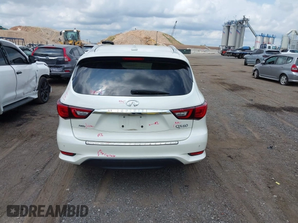 2020 Infiniti QX60 Luxe with VIN 5N1DL0MM2LC506031, listed as a IAAI auction lot 42701561 with 31,424 mi miles and . Bid and sale history available at DreamBid. Image 16.