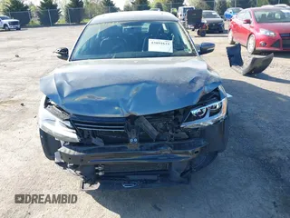 2013 Volkswagen Jetta TDI w/Premium z VIN 3VWLL7AJ6DM291317, wystawiony jako IAAI lot #42091621 z przebiegiem 169 448 mil mil oraz . Historia ofert i sprzedaży dostępna na DreamBid. Obrazek 12.