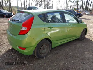 2013 Hyundai Accent GS with VIN KMHCT5AE3DU111034, listed as a IAAI auction lot 41479109 with 191,059 mi miles and . Bid and sale history available at DreamBid. Image 4.