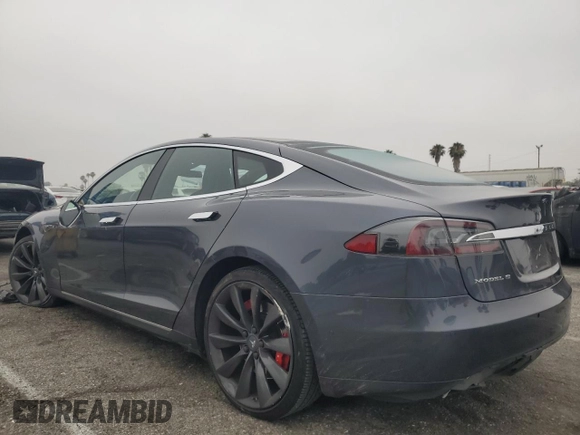 2014 Tesla Model S 60 with VIN 5YJSA1H10EFP60690, listed as a Copart auction lot 62515065 with 57,864 mi miles and Clean title. Bid and sale history available at DreamBid. Image 2.