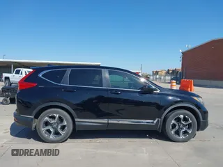 2018 Honda CR-V Touring with VIN 2HKRW2H91JH630702, listed as a IAAI auction lot 41983516 with 84,355 mi miles. Bid and sale history available at carsss.com. Image 13.