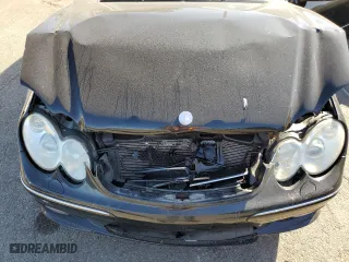 2003 Mercedes-Benz CLK-Class 5.0L with VIN WDBTJ75JX3F039229, listed as a Copart auction lot 77006714 with 111,617 mi miles and Salvage Title. Bid and sale history available at carsss.com. Image 11.