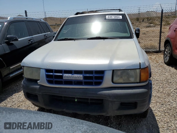 1999 Isuzu Rodeo S with VIN 4S2CK58W2X4361475, listed as a Copart auction lot 63873864 with 232,406 mi miles and Salvage Title. Bid and sale history available at DreamBid. Image 5.