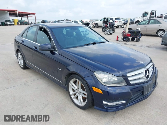 2012 Mercedes-Benz C-Class C 250 Sport with VIN WDDGF4HB1CA599859, listed as a IAAI auction lot 42120154 with 74,151 mi miles. Bid and sale history available at carsss.com. Image 1.