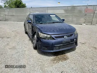 2013 Scion tC z VIN JTKJF5C76D3063027, wystawiony jako Copart lot #56604955 z przebiegiem 109 813 mil mil oraz Szkoda całkowita • Salvage title. Historia ofert i sprzedaży dostępna na DreamBid. Obrazek 13.