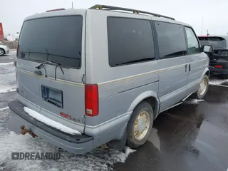 1997 GMC Safari with VIN 1GKEL19W2VB506844, listed as a IAAI auction lot 41719861 with 228,306 mi miles and . Bid and sale history available at carsss.com. Image 4.
