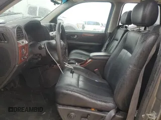 2005 GMC Envoy SLT with VIN 1GKDT13S452307702, listed as a Copart auction lot 74204644 with 0 mi miles and Salvage Title. Bid and sale history available at carsss.com. Image 7.