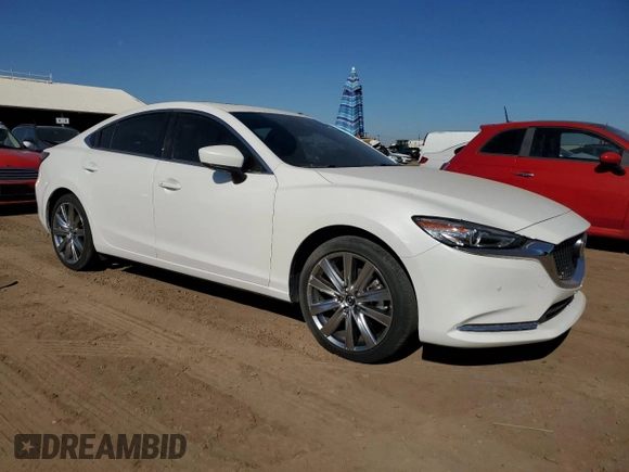 2021 Mazda 6 Signature with VIN JM1GL1XY5M1614601, listed as a Copart auction lot 73769893 with 22,617 mi miles and . Bid and sale history available at DreamBid. Image 4.