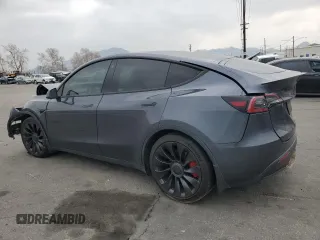 2022 Tesla Model Y Performance z VIN 7SAYGDEF1NF457494, wystawiony jako Copart lot #43287315 z przebiegiem 79 855 mil mil oraz Szkoda całkowita • Salvage title. Historia ofert i sprzedaży dostępna na DreamBid. Obrazek 2.