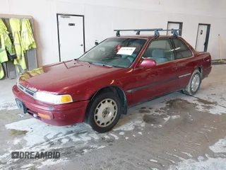 1992 Honda Accord z VIN 1HGCB7252NA025400, wystawiony jako IAAI lot #42438708 z przebiegiem 306 637 mil mil oraz . Historia ofert i sprzedaży dostępna na DreamBid. Obrazek 2.