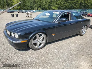 2004 Jaguar XJ with VIN SAJWA73B44TG20291, listed as a Copart auction lot 54452375 with 148,491 mi miles and Clean Title. Bid and sale history available at carsss.com. Image 1.