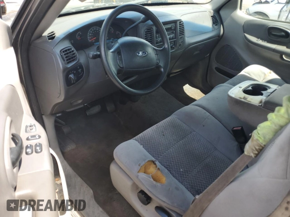 2004 Ford F-150 XL with VIN 2FTRX17W54CA32203, listed as a Copart auction lot 61666385 with Not provided miles and Salvage title. Bid and sale history available at DreamBid. Image 8.