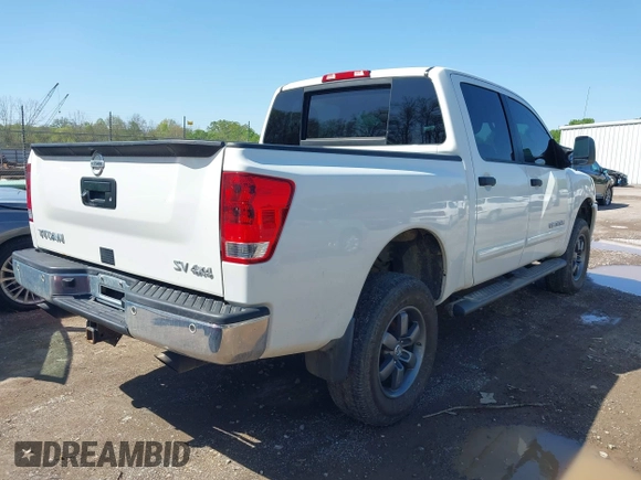 2014 Nissan Titan S with VIN 1N6AA0EC3EN502951, listed as a IAAI auction lot 41956309 with 128,464 mi miles and . Bid and sale history available at DreamBid. Image 4.