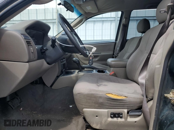 2004 Jeep Grand Cherokee Laredo with VIN 1J4GX48N94C397241, listed as a Copart auction lot 49183315 with 189,099 mi miles and Salvage title. Bid and sale history available at DreamBid. Image 7.