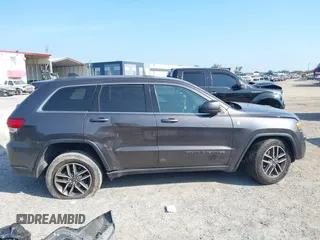 2020 Jeep Grand Cherokee Altitude with VIN 1C4RJFAG6LC325970, listed as a IAAI auction lot 42199817 with 51,259 mi miles and . Bid and sale history available at DreamBid. Image 13.