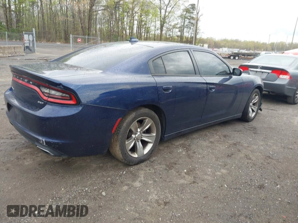 2015 Dodge Charger SXT with VIN 2C3CDXHG5FH878642, listed as a IAAI auction lot 42035569 with 228,000 mi miles and . Bid and sale history available at DreamBid. Image 4.