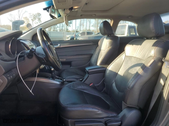 2013 Kia Forte Koup SX with VIN KNAFW6A3XD5695047, listed as a Copart auction lot 82750274 with 123840 miles and Salvage Title. Bid and sale history available at carsss.com. Image 7.