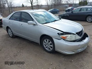 2002 Toyota Camry LE z VIN 4T1BE32K62U608221, wystawiony jako IAAI lot #41834295 z przebiegiem 195 537 mil mil oraz . Historia ofert i sprzedaży dostępna na DreamBid. Obrazek 1.