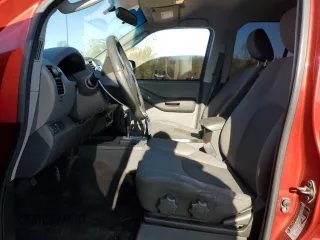 2012 Nissan Xterra X with VIN 5N1AN0NW7CC513862, listed as a Copart auction lot 54336635 with 104,682 mi miles and Salvage Title. Bid and sale history available at carsss.com. Image 7.