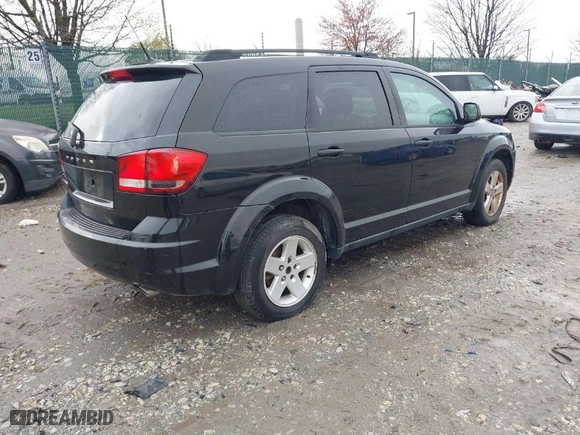 2011 Dodge Journey Mainstreet with VIN 3D4PG1FG6BT516523, listed as a IAAI auction lot 41967326 with 139,957 mi miles. Bid and sale history available at carsss.com. Image 4.
