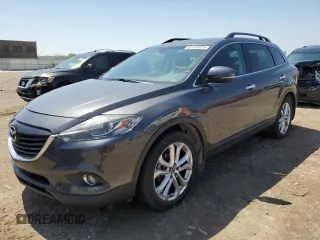 2013 Mazda CX-9 Grand Touring z VIN JM3TB3DA2D0400330, wystawiony jako Copart lot #53102025 z przebiegiem 161 987 mil mil oraz Szkoda całkowita • Salvage title. Historia ofert i sprzedaży dostępna na DreamBid. Obrazek 1.